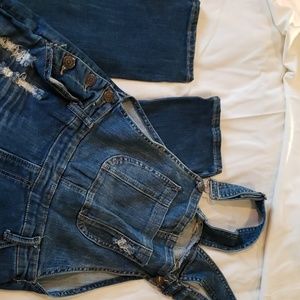 Distressed overalls jumpsuit